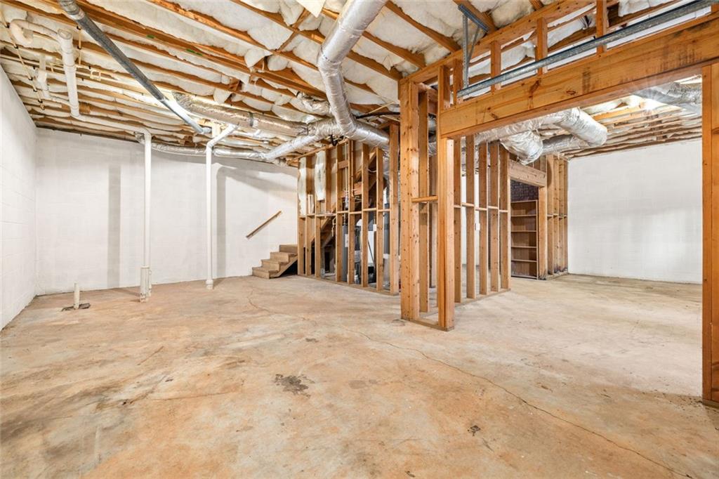 4239 Mangum Mill Road Gainesville, GA 30507 - Photo 26 of 33 a view of a room with wooden walls