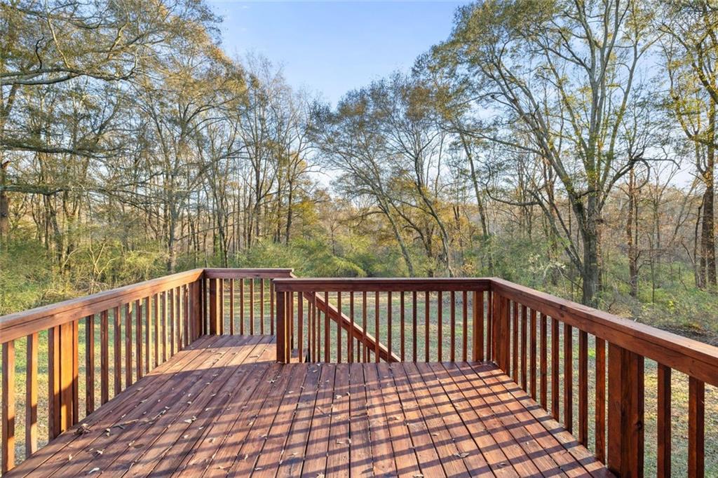 4239 Mangum Mill Road Gainesville, GA 30507 - Photo 31 of 33 a view of balcony with wooden floor and fence