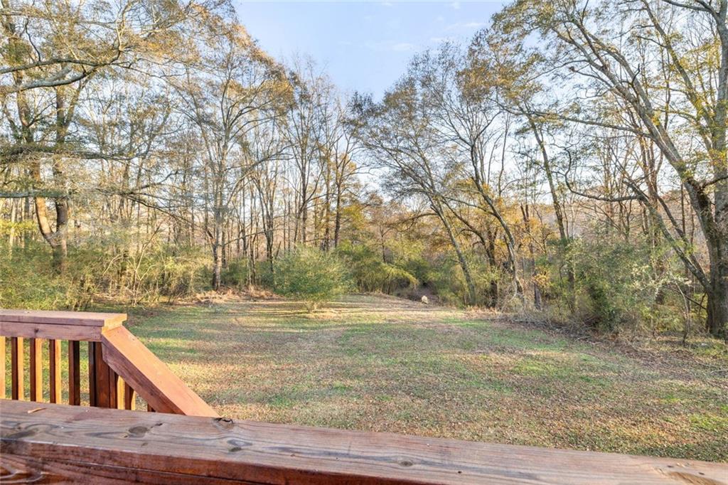 4239 Mangum Mill Road Gainesville, GA 30507 - Photo 6 of 33 a view of a yard with trees