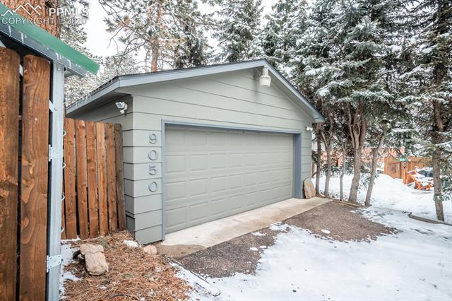 9050 Picabo Road Cascade, CO 80809 - Photo 37 of 40 2 car garage plus a one car enclosed carport