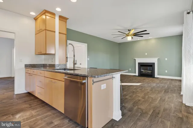 a large bathroom with double vanity and a large mirror