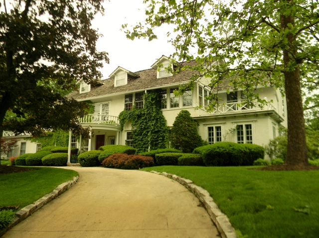 200 River Bluff Road Elgin, IL 60120 - Photo 1 of 19 a front view of a house with garden