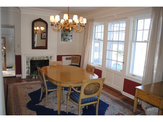 200 River Bluff Road Elgin, IL 60120 - Photo 7 of 19 a view of a dining room with furniture and chandelier