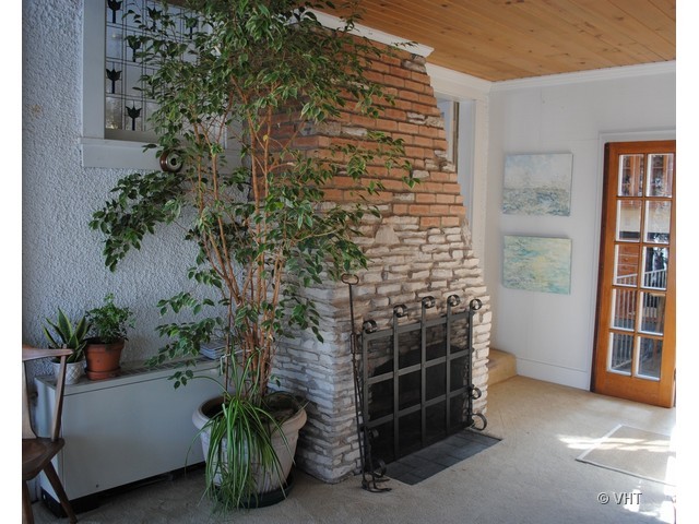 200 River Bluff Road Elgin, IL 60120 - Photo 10 of 19 a backyard of a house with potted plants