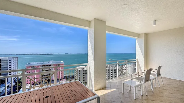 a bathroom with a sink a toilet and shower curtain