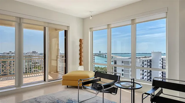 a view of a balcony with an ocean view