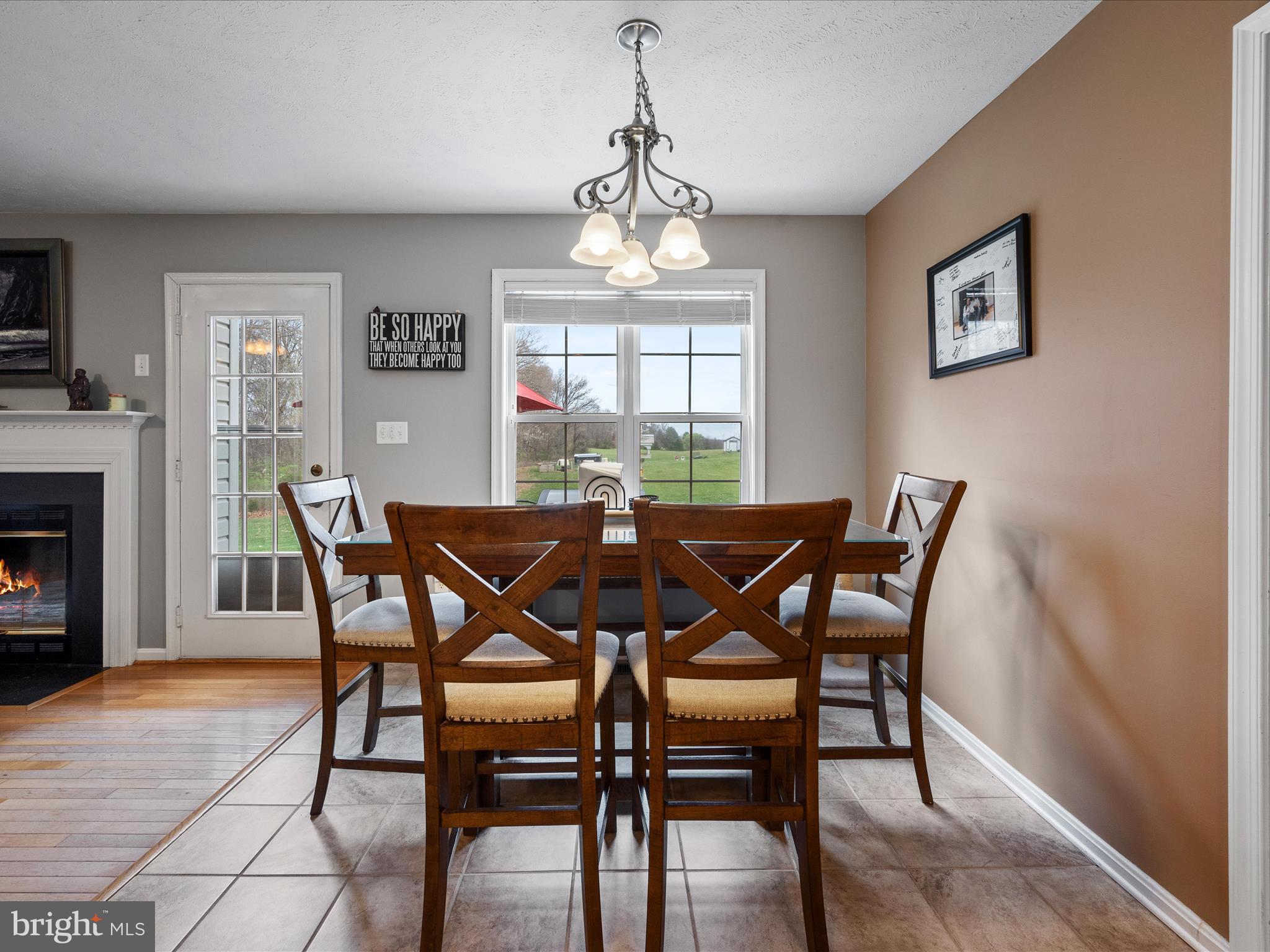 993 Rockland Road Front Royal, VA 22630 - Photo 12 of 37 a view of a dining room with furniture window and wooden floor