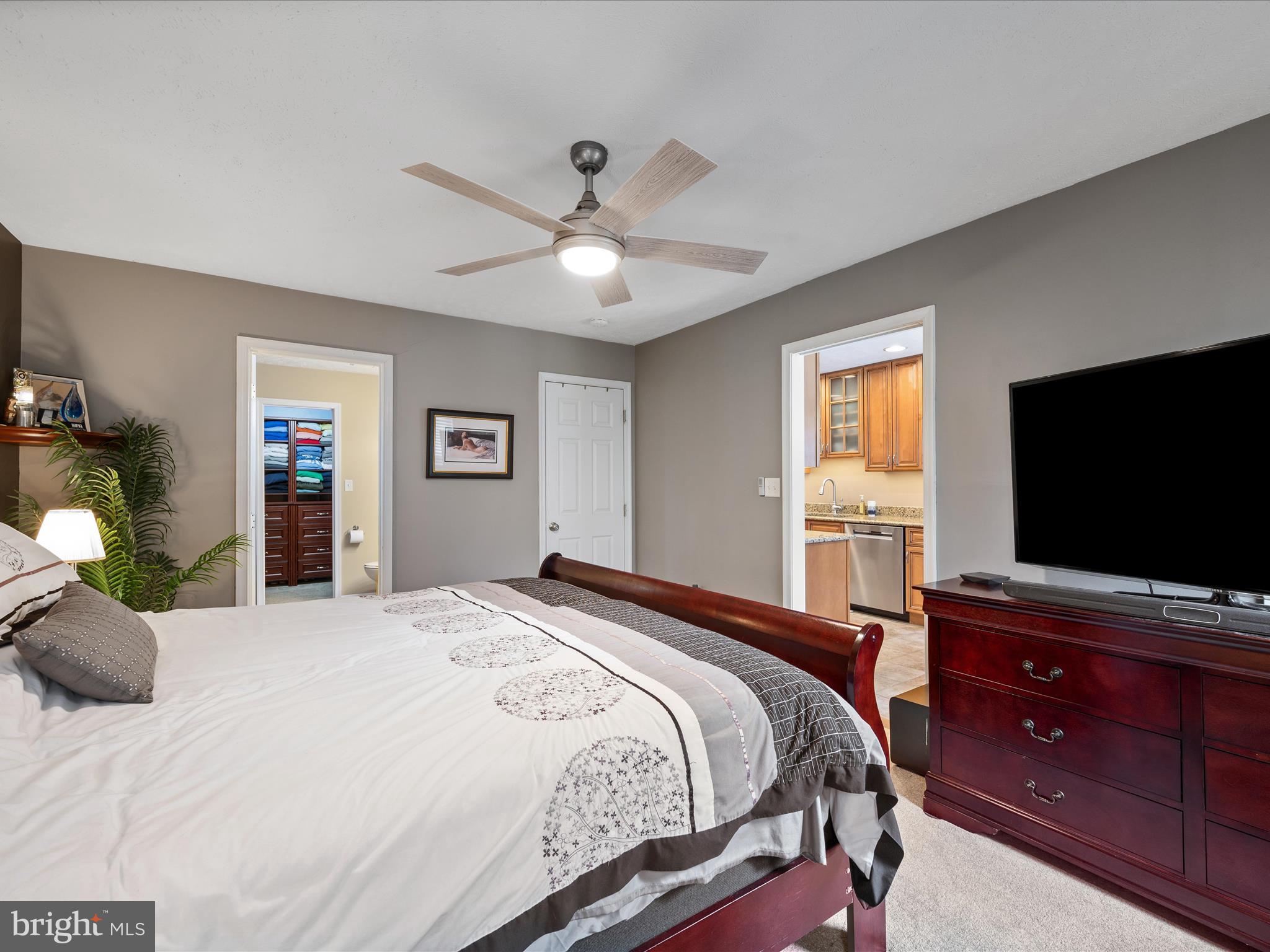 993 Rockland Road Front Royal, VA 22630 - Photo 14 of 37 a bedroom with a bed and a flat screen tv