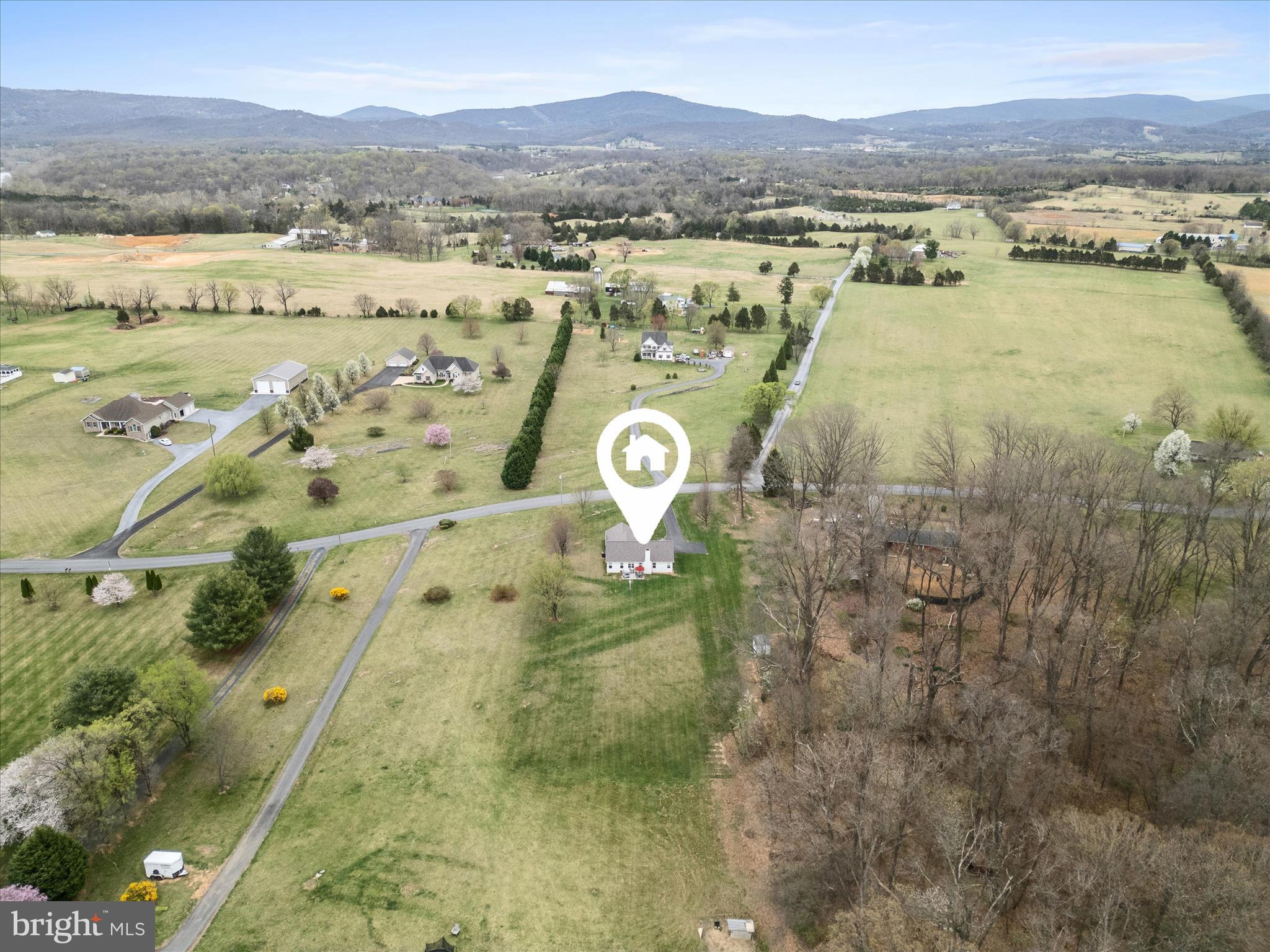 993 Rockland Road Front Royal, VA 22630 - Photo 3 of 37 a view of a lake with mountains in the background
