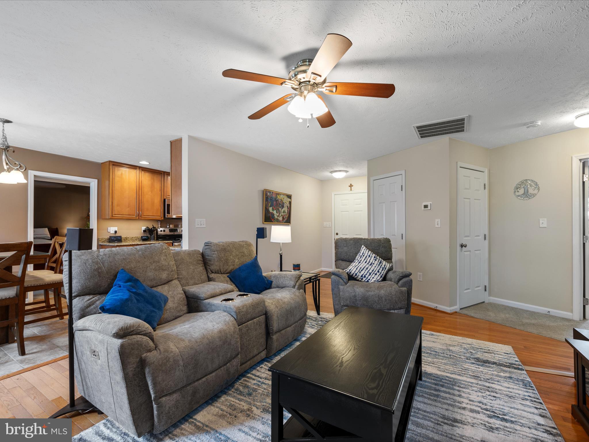 993 Rockland Road Front Royal, VA 22630 - Photo 10 of 37 a living room with furniture and a wooden floor