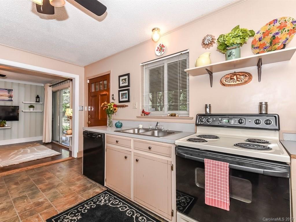 4419 Castleton Road Charlotte, NC 28211 - Photo 11 of 24 a kitchen with a stove and a sink