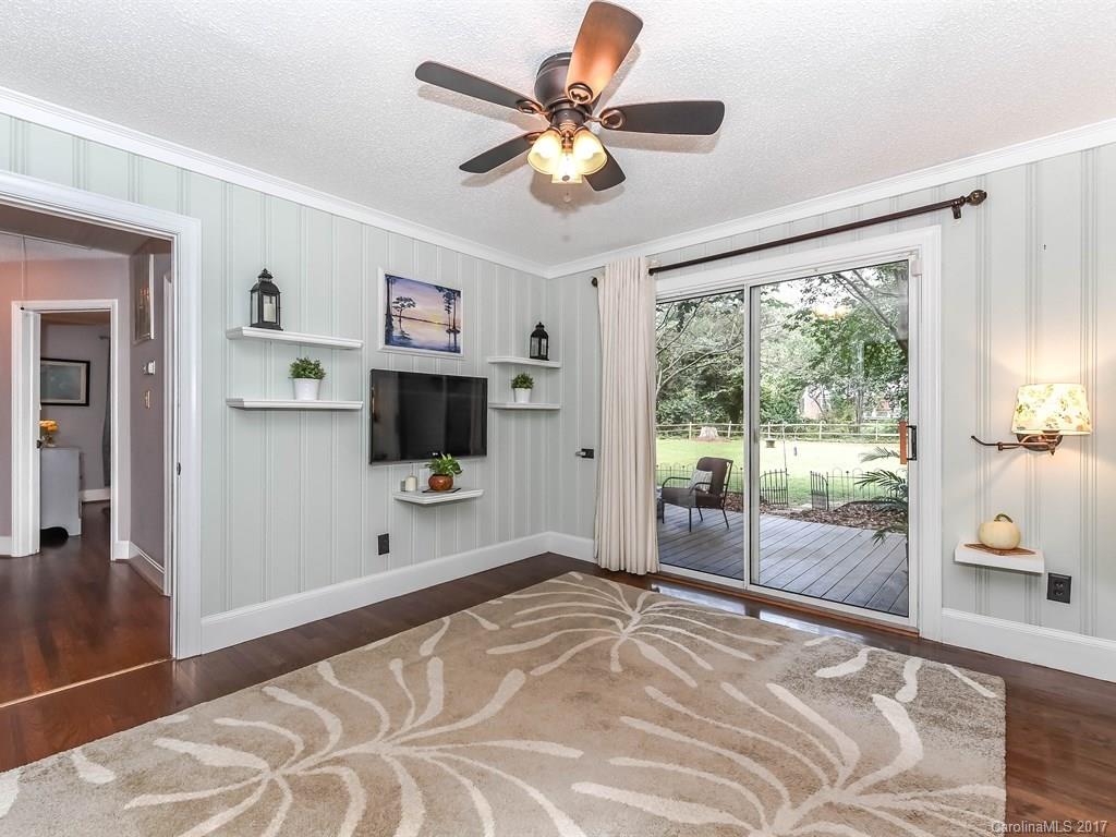 4419 Castleton Road Charlotte, NC 28211 - Photo 12 of 24 a bedroom with a bed and a large window