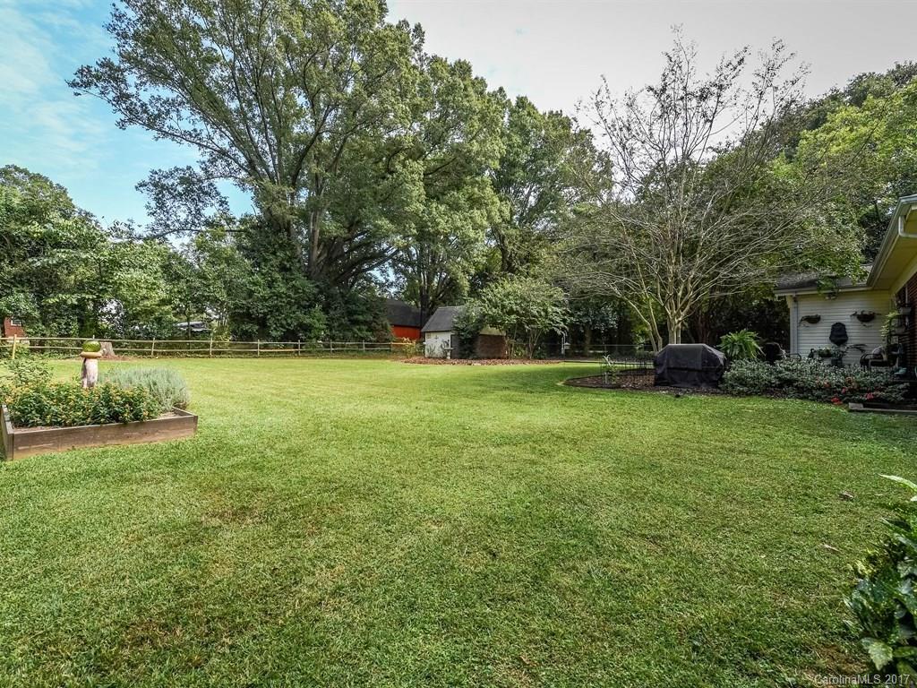 4419 Castleton Road Charlotte, NC 28211 - Photo 19 of 24 a view of a garden with houses