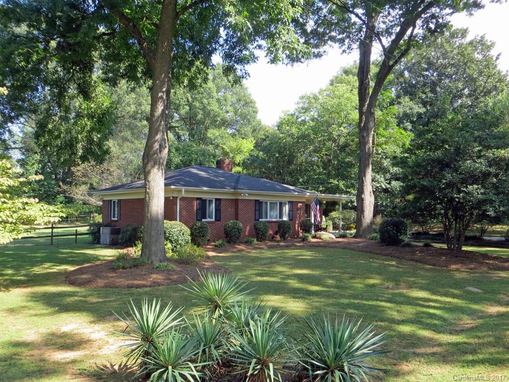 4419 Castleton Road Charlotte, NC 28211 - Photo 20 of 24 a view of a yard in front of a house with a large tree