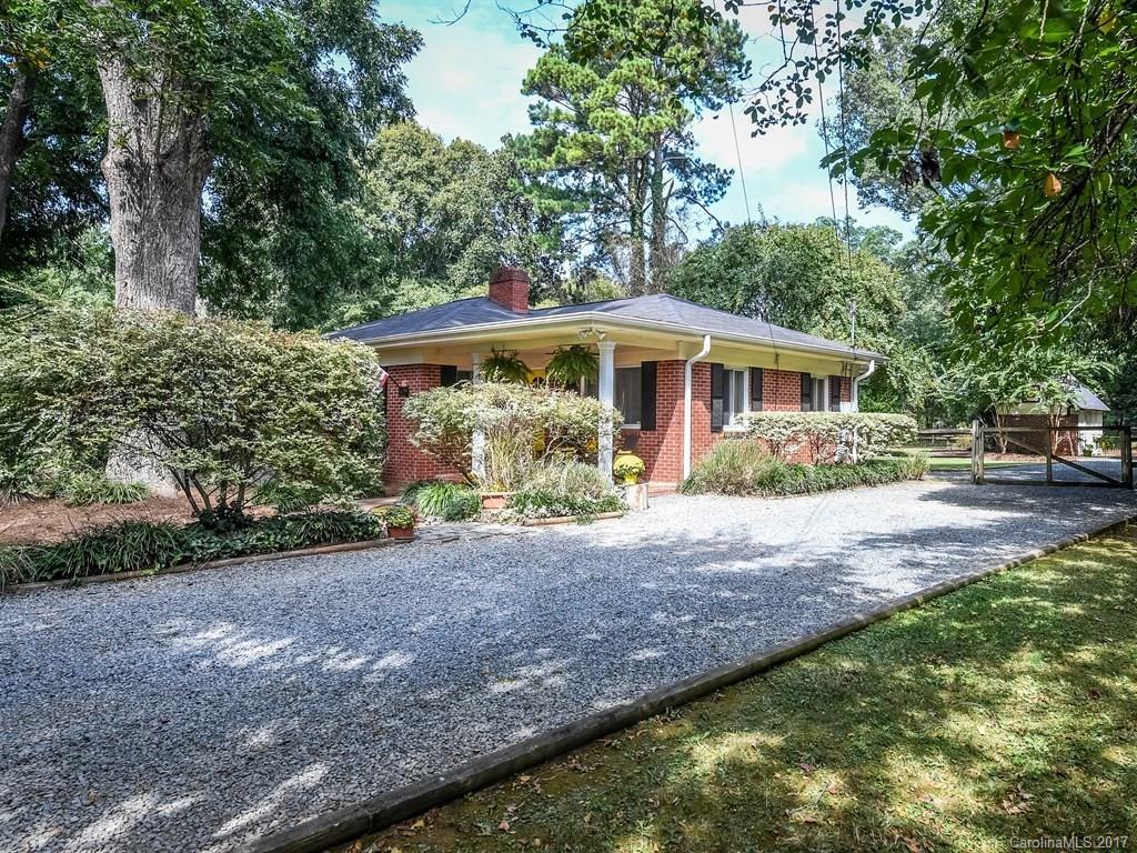 4419 Castleton Road Charlotte, NC 28211 - Photo 21 of 24 a view of a house with a yard