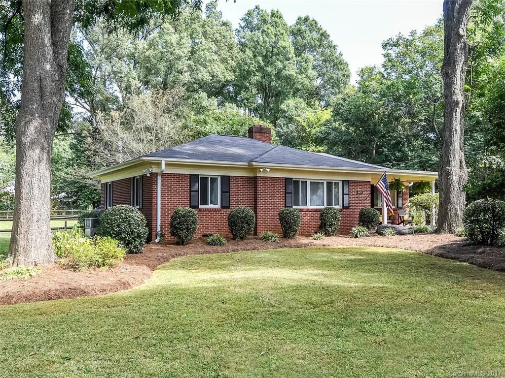 4419 Castleton Road Charlotte, NC 28211 - Photo 24 of 24 a front view of a house with yard porch and furniture