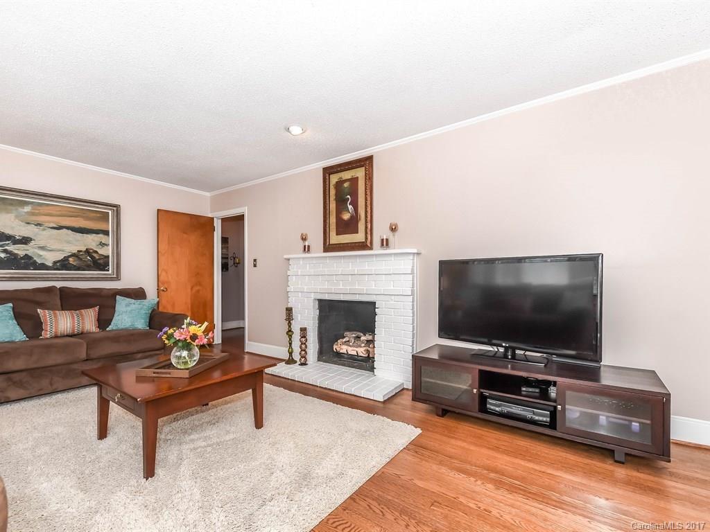 4419 Castleton Road Charlotte, NC 28211 - Photo 6 of 24 a living room with furniture and a flat screen tv