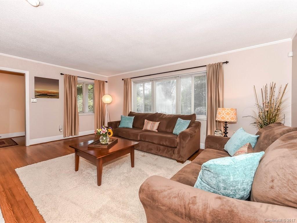 4419 Castleton Road Charlotte, NC 28211 - Photo 7 of 24 a living room with furniture and a large window