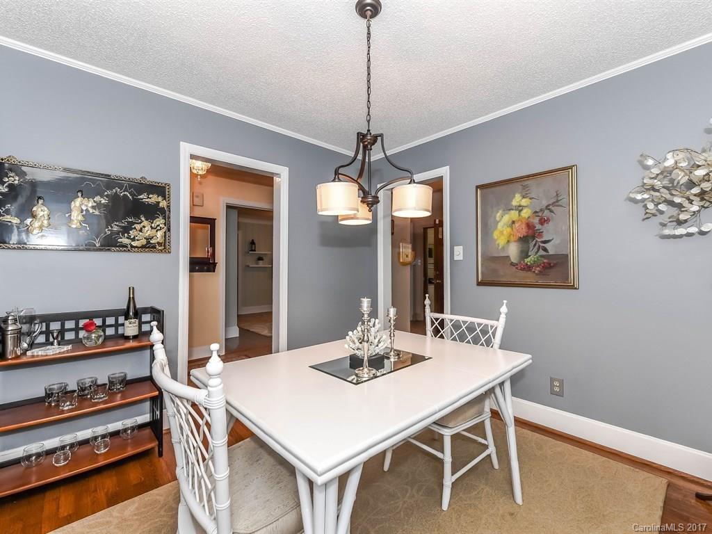 4419 Castleton Road Charlotte, NC 28211 - Photo 8 of 24 a dining room with furniture and window