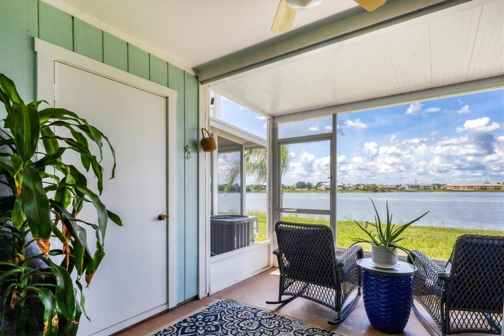 26310 Rampart Boulevard, Unit D504 Punta Gorda, FL 33983 - Photo 33 of 46 a dining room with furniture water view and a potted plant