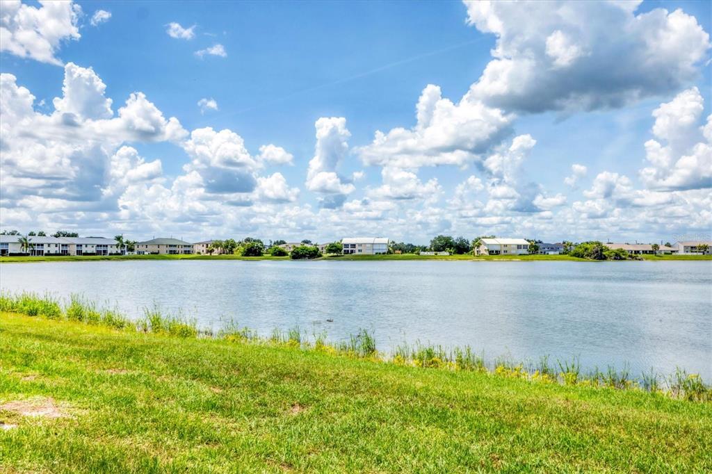26310 Rampart Boulevard, Unit D504 Punta Gorda, FL 33983 - Photo 36 of 46 a view of a lake
