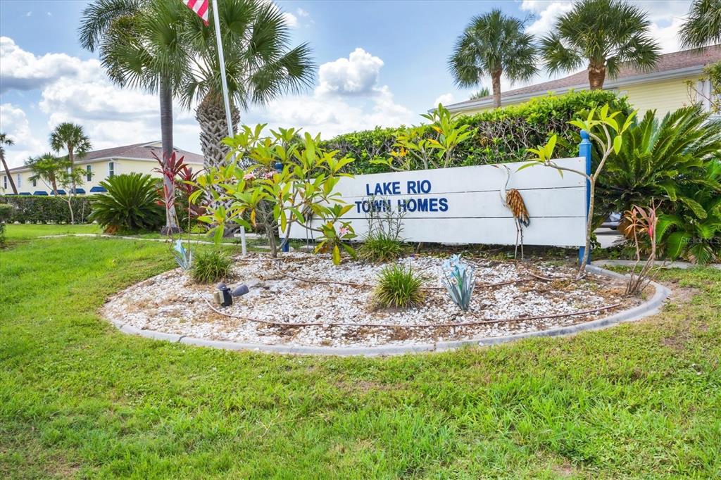 26310 Rampart Boulevard, Unit D504 Punta Gorda, FL 33983 - Photo 42 of 46 a view of a garden with a fountain