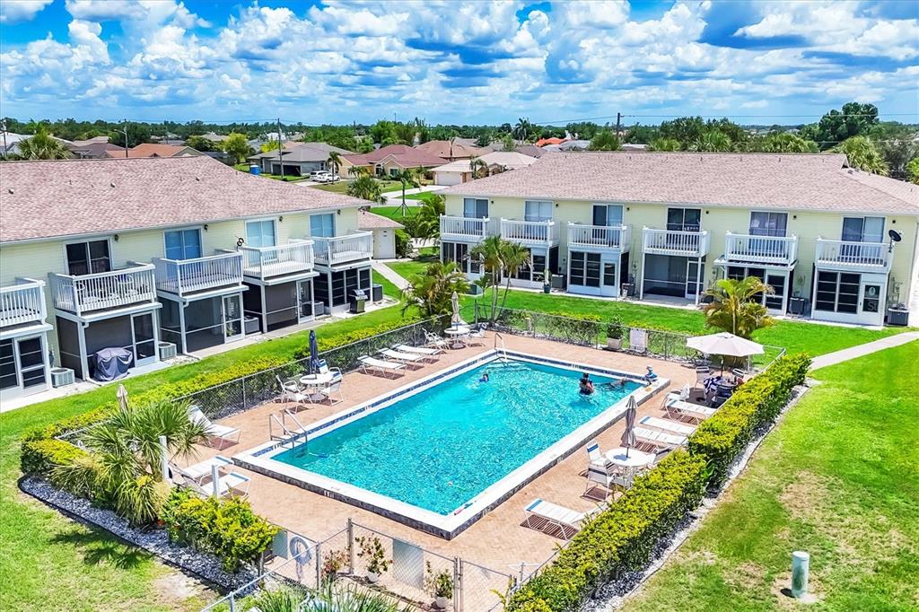 26310 Rampart Boulevard, Unit D504 Punta Gorda, FL 33983 - Photo 44 of 46 aerial view of a house with a yard