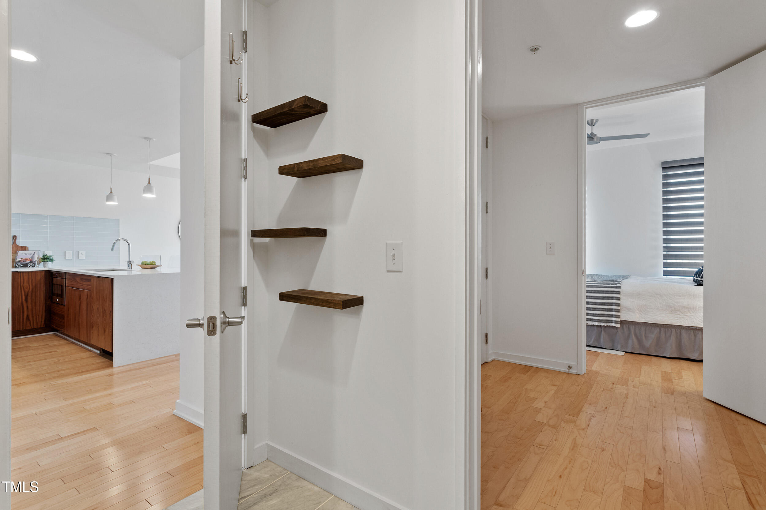 523 South West Street, Unit 404 Raleigh, NC 27601 - Photo 22 of 34 wooden floor in an empty room