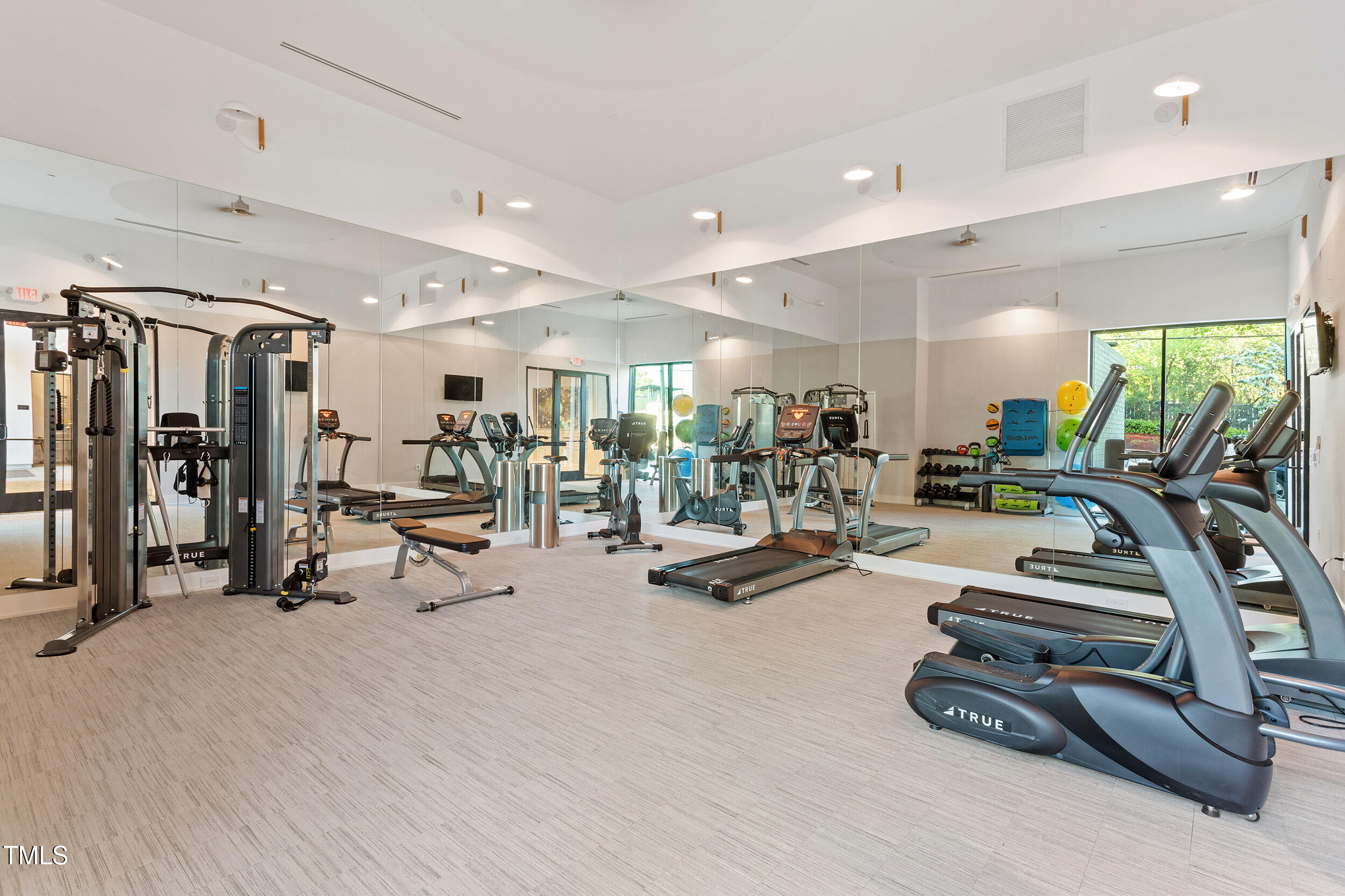 523 South West Street, Unit 404 Raleigh, NC 27601 - Photo 25 of 34 a view of a room with gym equipment