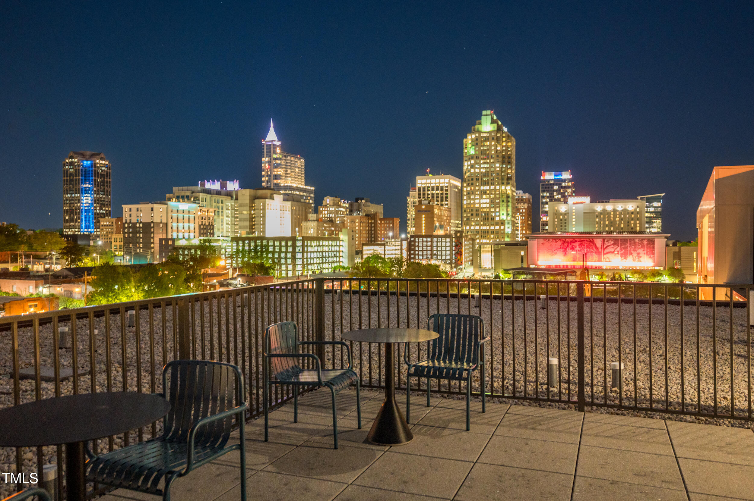523 South West Street, Unit 404 Raleigh, NC 27601 - Photo 31 of 34 a view of a building from a chairs