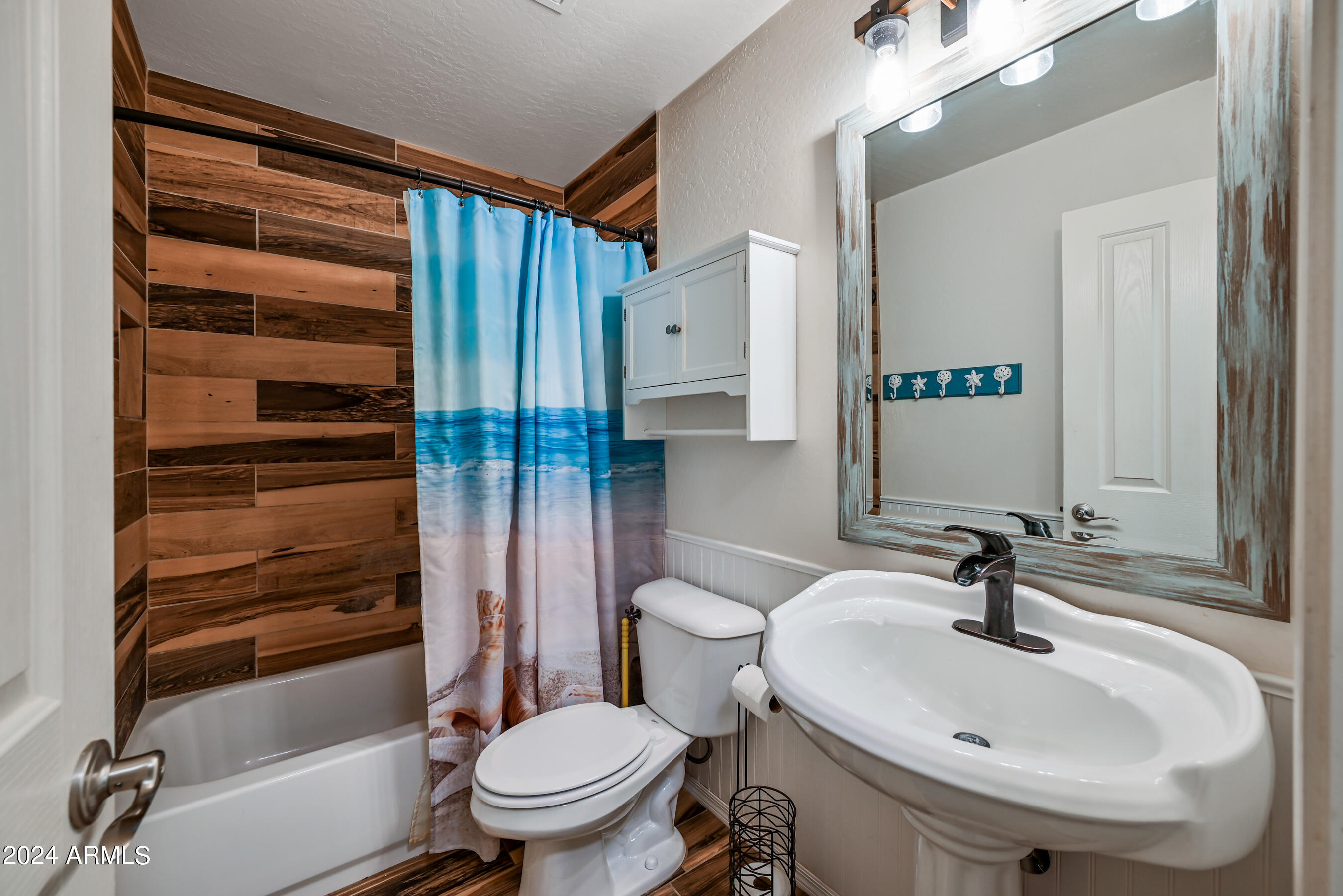 2992 East Blue Ridge Way Gilbert, AZ 85298 - Photo 20 of 25 a bathroom with a sink toilet and shower