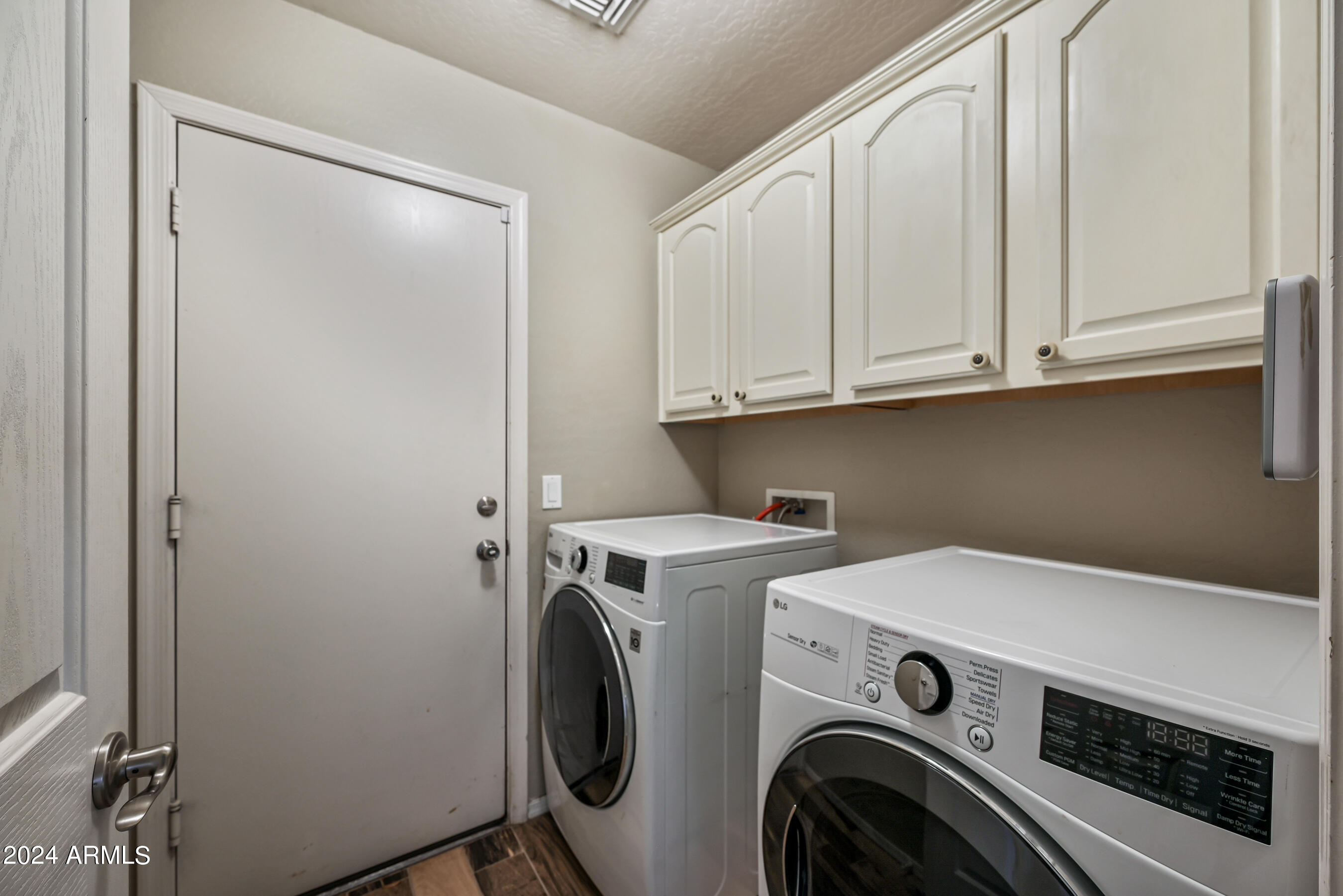 2992 East Blue Ridge Way Gilbert, AZ 85298 - Photo 21 of 25 a utility room with dryer and washer