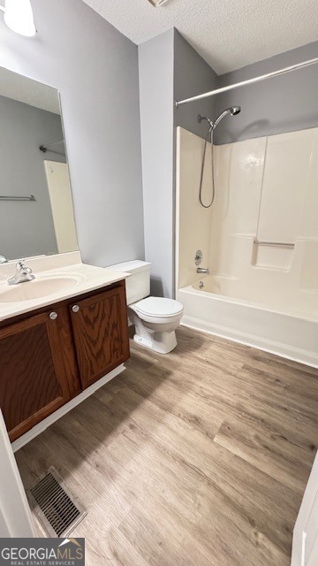 1115 Country Club Place Kennesaw, GA 30144 - Photo 12 of 13 a bathroom with a sink a toilet and shower