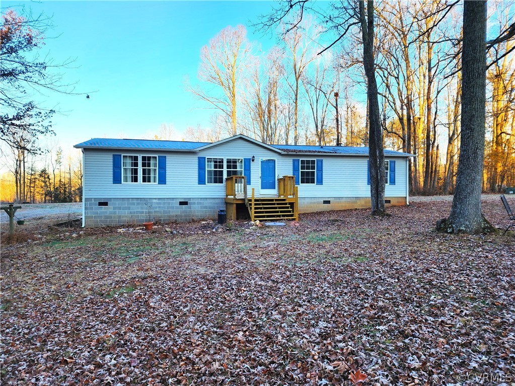 1609 Jeter Road Powhatan, VA 23139 - Photo 1 of 30 a view of a house with a yard and large trees