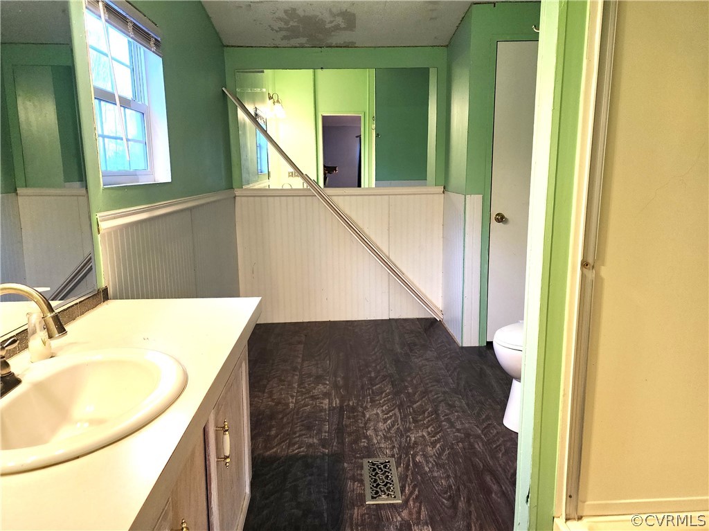 1609 Jeter Road Powhatan, VA 23139 - Photo 22 of 30 a en suite bathroom with a sink and mirror