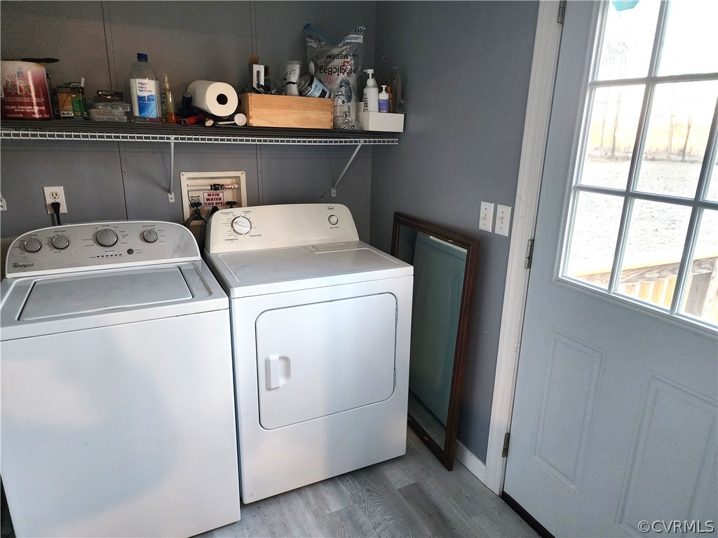 1609 Jeter Road Powhatan, VA 23139 - Photo 23 of 30 a view of storage and utility room with washer and dryer