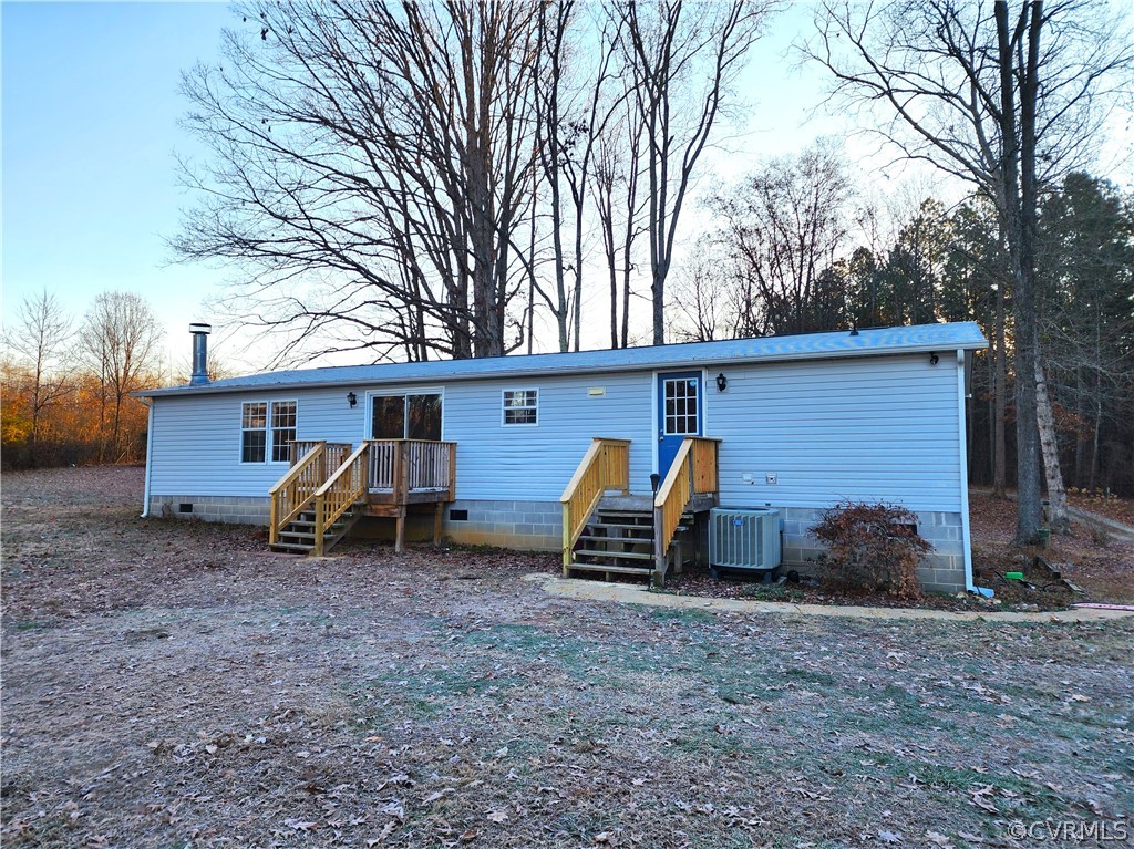 1609 Jeter Road Powhatan, VA 23139 - Photo 29 of 30 a view of a house with a yard and car parked