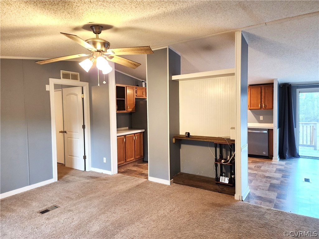 1609 Jeter Road Powhatan, VA 23139 - Photo 7 of 30 a view of a kitchen with a sink and a refrigerator