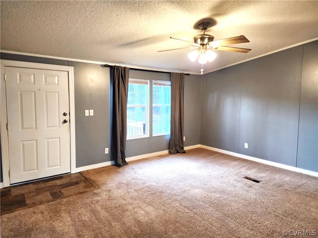 1609 Jeter Road Powhatan, VA 23139 - Photo 8 of 30 an empty room with closet and a ceiling fan