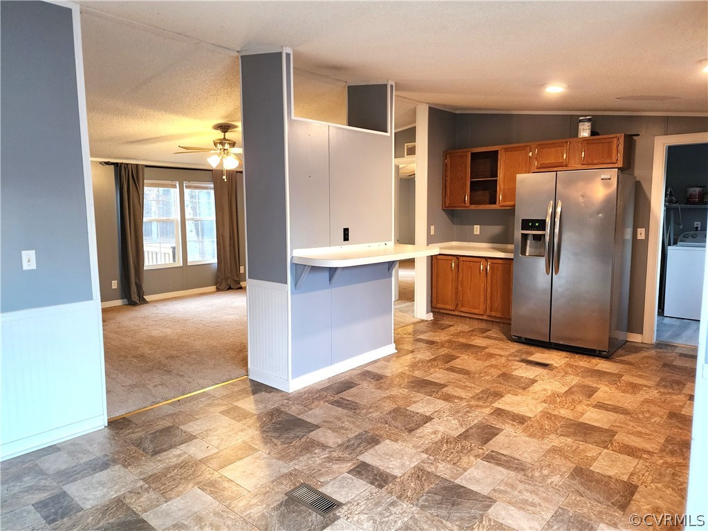 1609 Jeter Road Powhatan, VA 23139 - Photo 10 of 30 a kitchen with stainless steel appliances granite countertop a refrigerator and a sink
