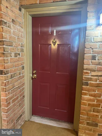 a view of a livingroom with a staircase