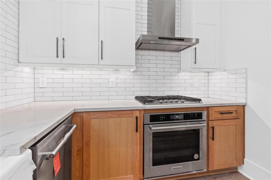 Lot 3 Cox Road Roswell, GA 30075 - Photo 13 of 37 a stove top oven sitting inside of a kitchen