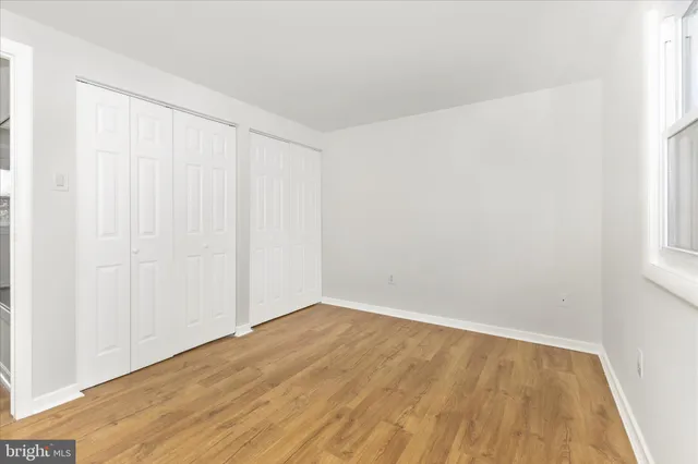 a view of a room that has a window in it