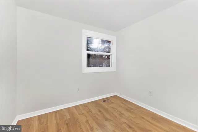 a bathroom with a toilet a sink and a shower
