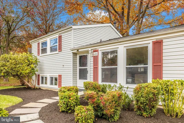 a view of a house with a garden
