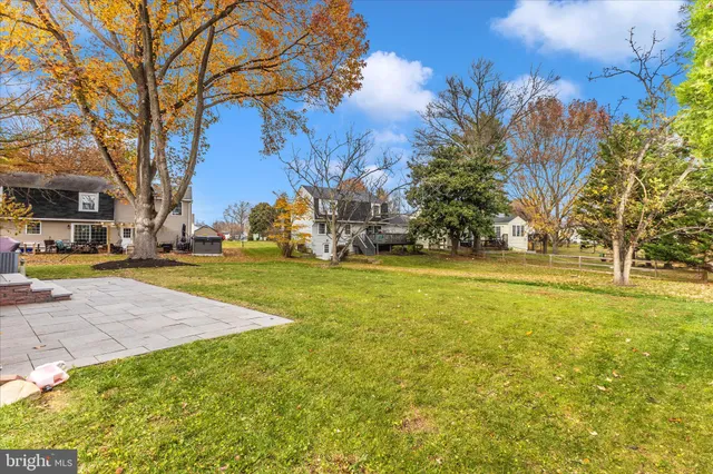 a view of a pathway with a yard