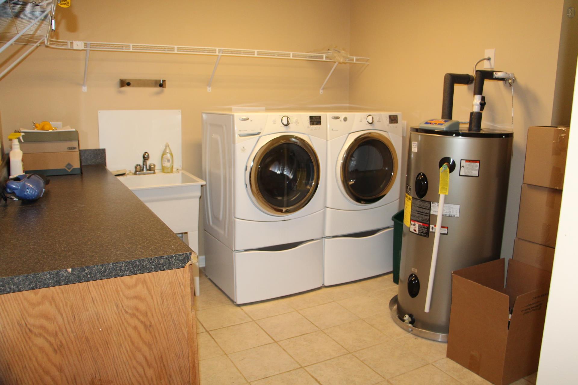 2341 Gunn Road Springfield, TN 37172 - Photo 15 of 27 a utility room with dryer and washer