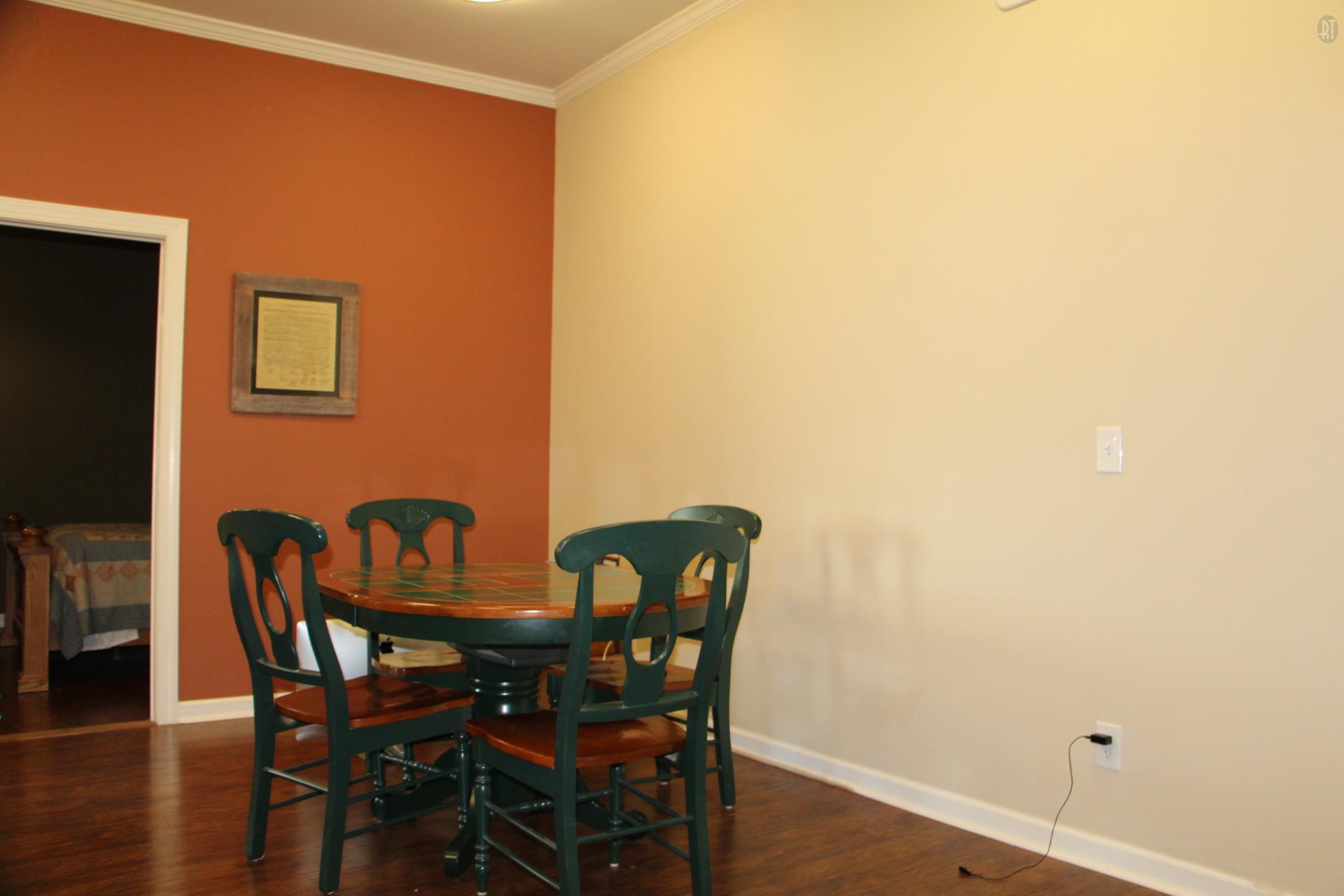 2341 Gunn Road Springfield, TN 37172 - Photo 17 of 27 a view of a dining room with furniture and wooden floor