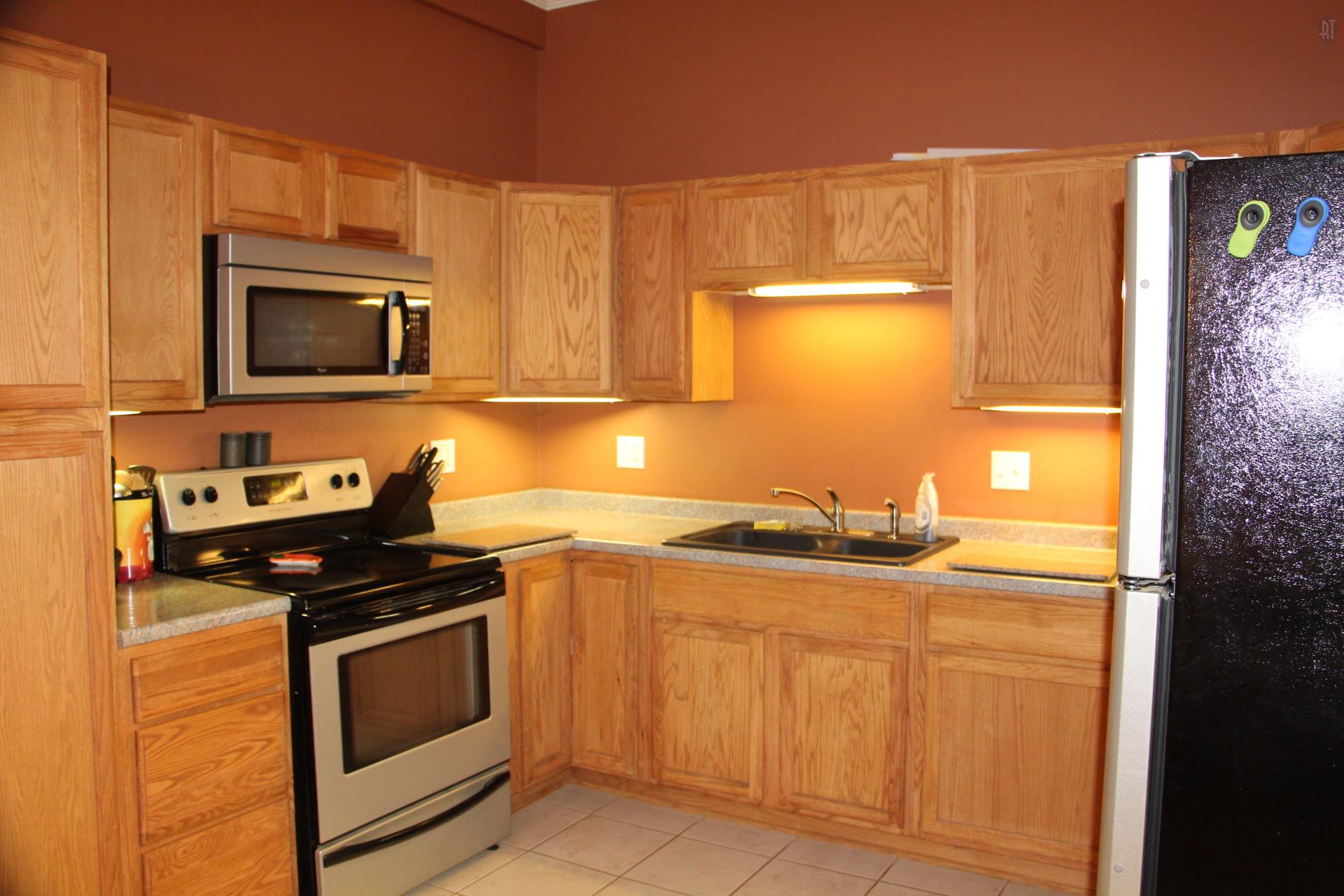 2341 Gunn Road Springfield, TN 37172 - Photo 18 of 27 a kitchen with granite countertop cabinets stainless steel appliances and a counter space