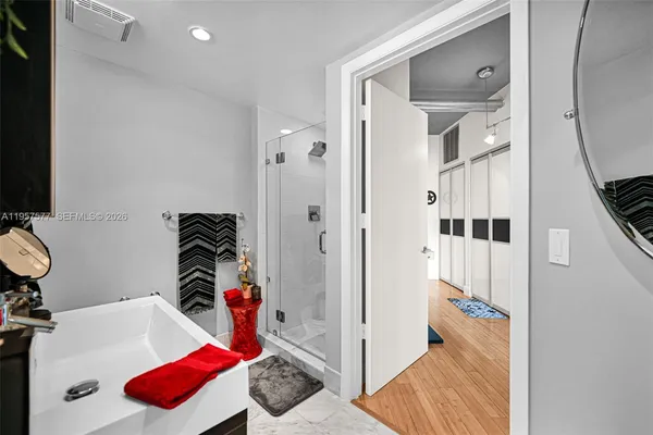 a bathroom with a shower and toilet